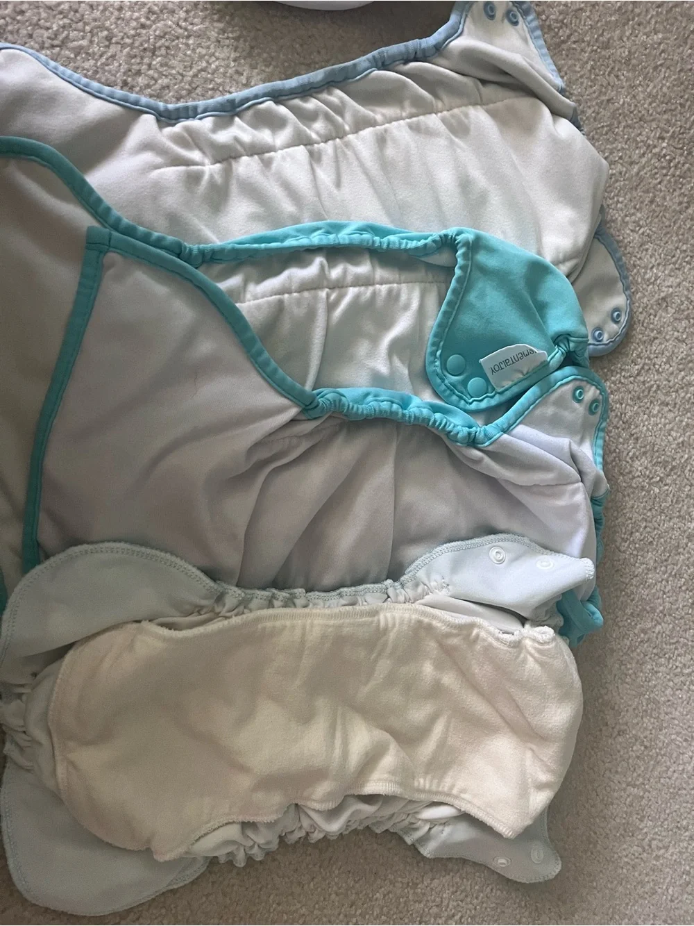 4 Cloth Diapers AIO all-in-one Apple Cheeks and Elemental Joy. Bonus swim diaper